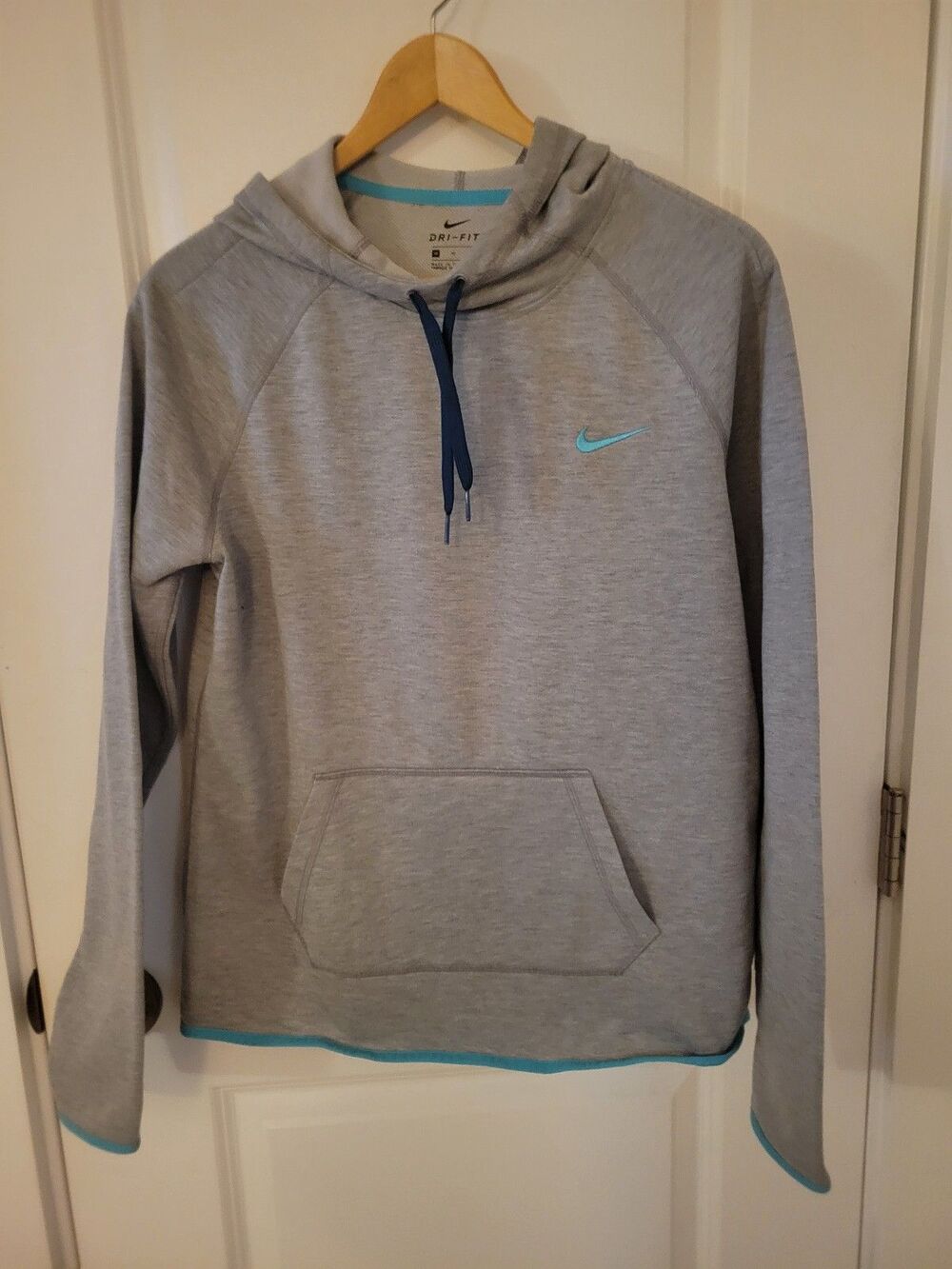 Women's Nike Dri-fit gray hoodie with blue trim